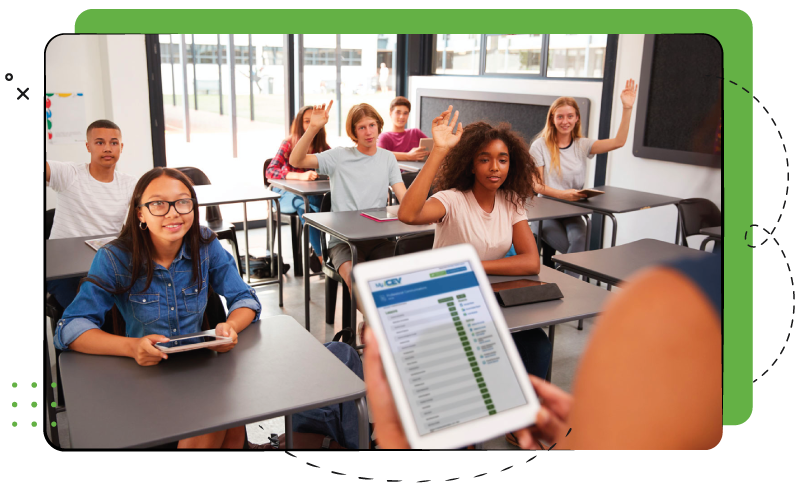 A classroom with kids raising their hands with a teacher in the foreground holding a tablet with the iCEV platform being displayed. 